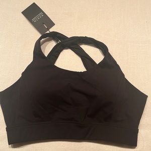 NVGTN black sports bra. Size medium. NWT. Never worn.